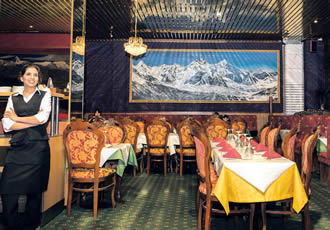 Prominent Nepalese decor envelops the dining area and welcomes up to 300 customers every day. 