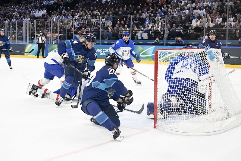 Finland beat Italy 11-0, set Olympic ice hockey shot record