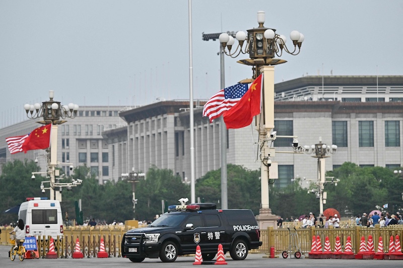 Trump arrives in Beijing with tech chiefs for Xi summit